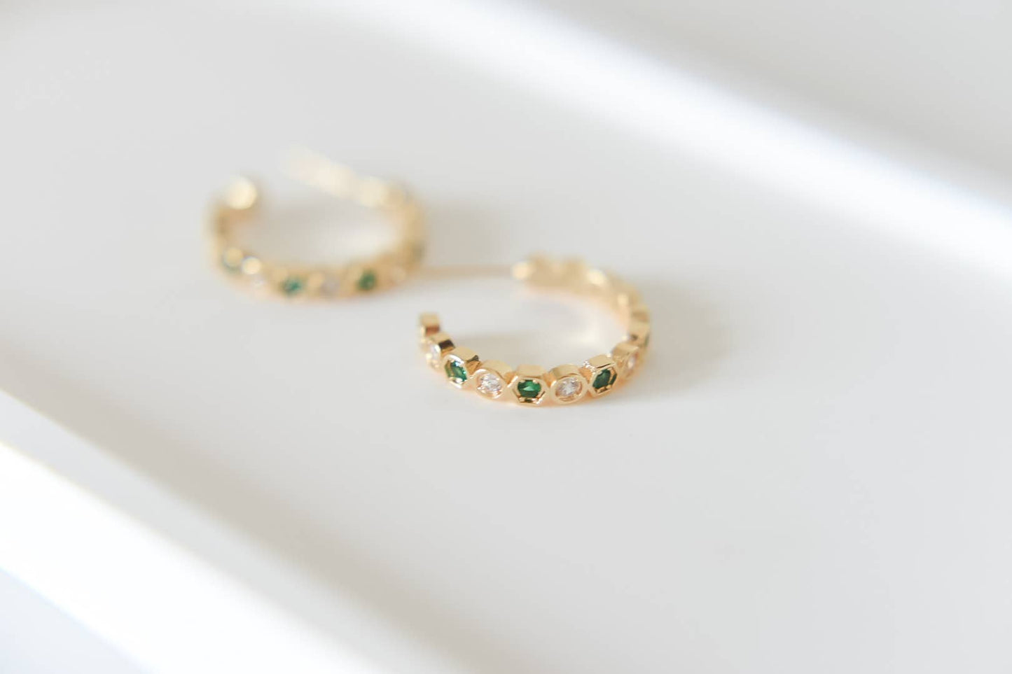 Mayble gold plated hoop studs | emerald green cz