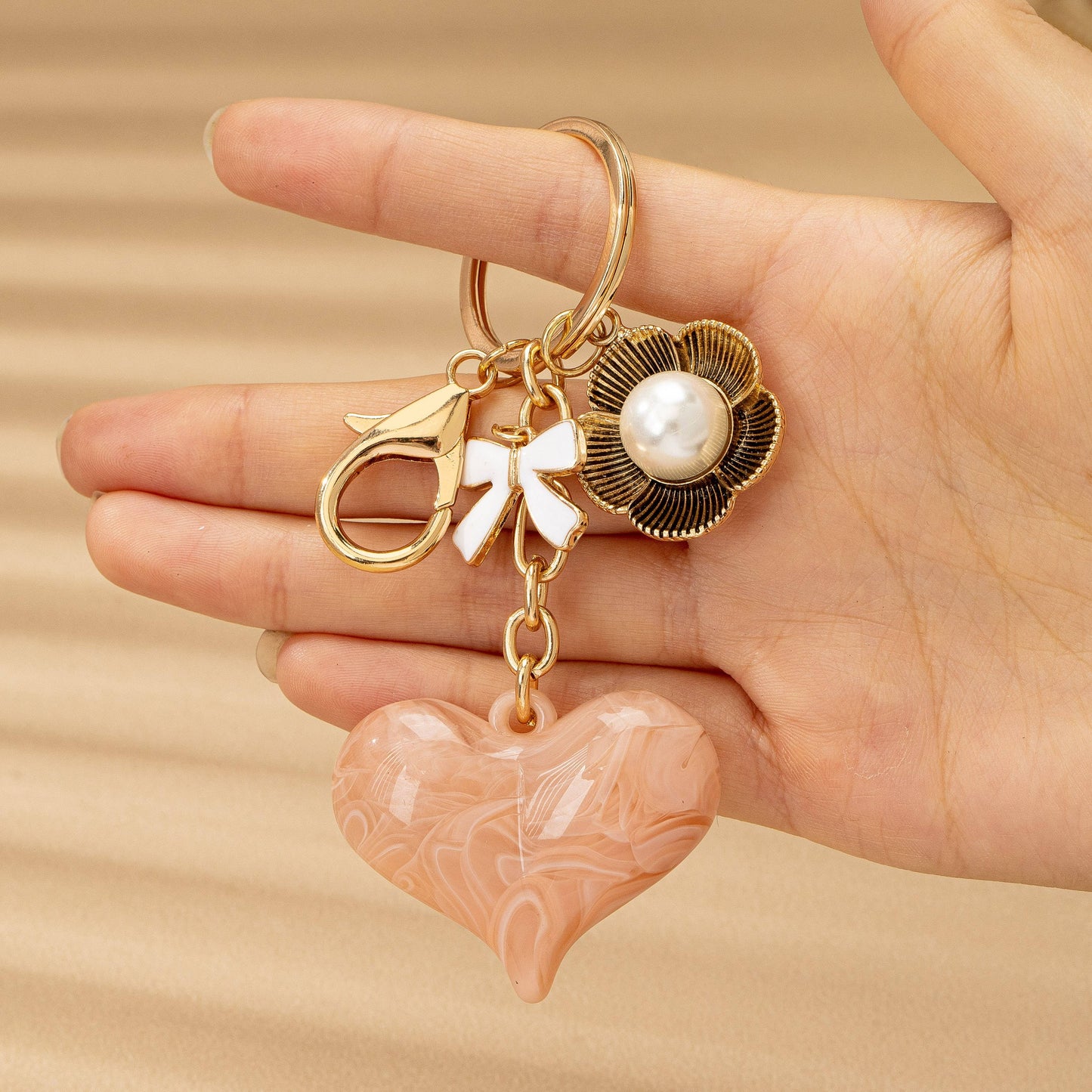 BAG CHARM HEART PERAL FLORAL BOW | 80K090
