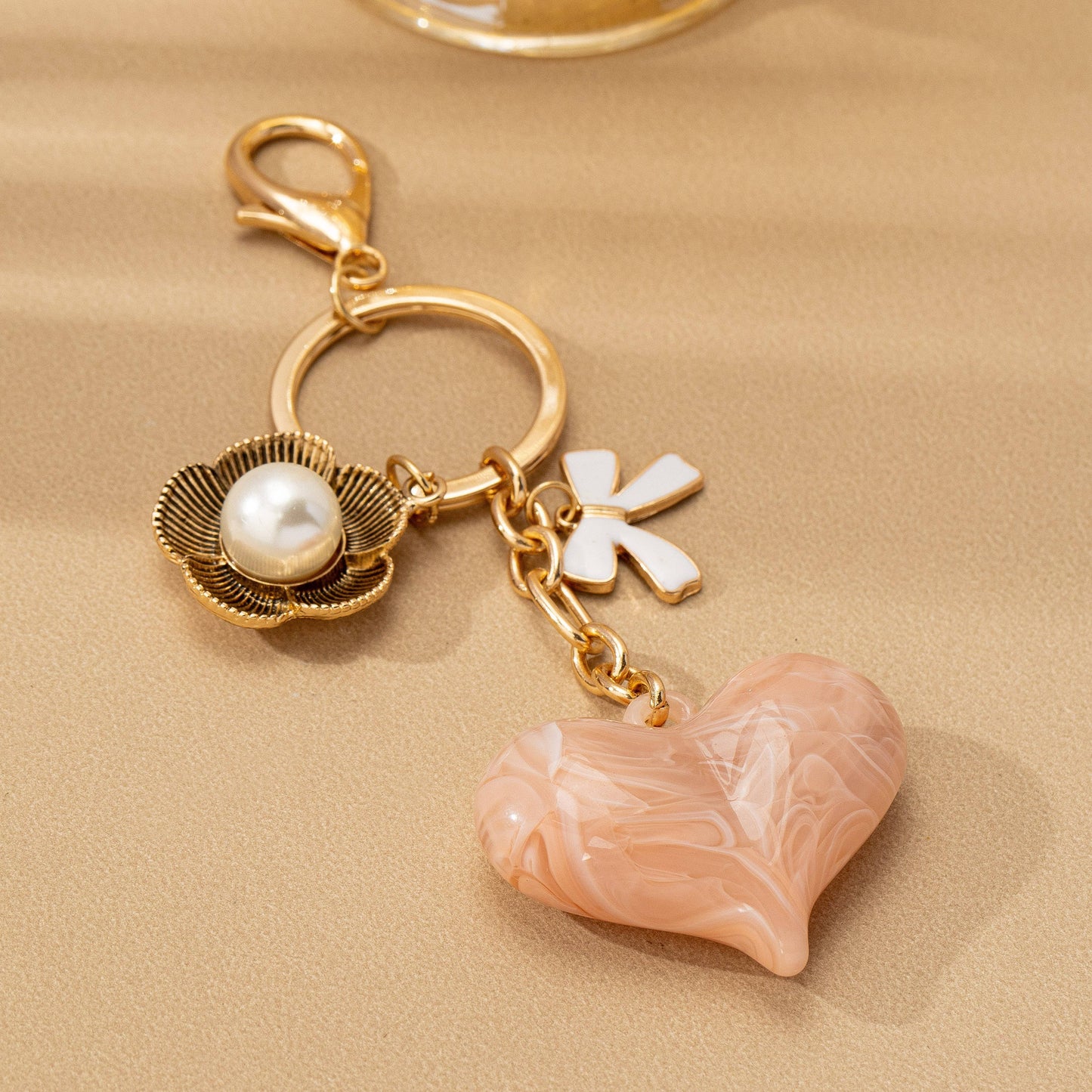 BAG CHARM HEART PERAL FLORAL BOW | 80K090