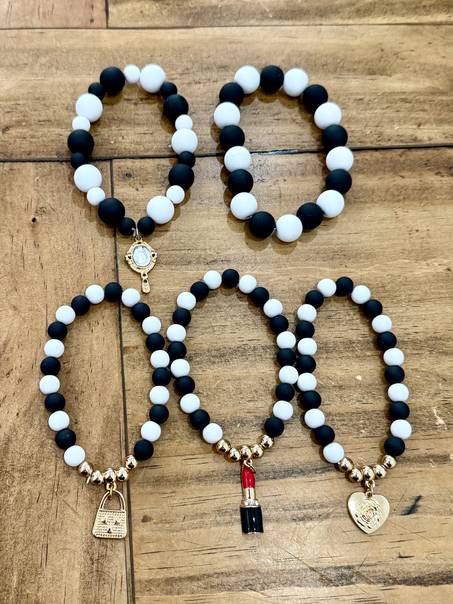 White and black beaded charm bracelet