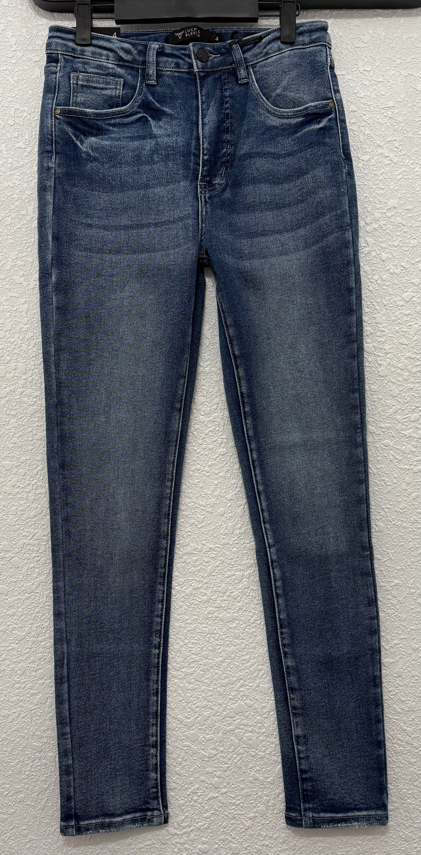 Mid Wash high rise skinny jeans